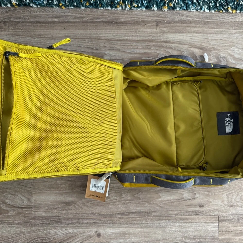 The North Face Men's Yellow Backpack with Gray Accents